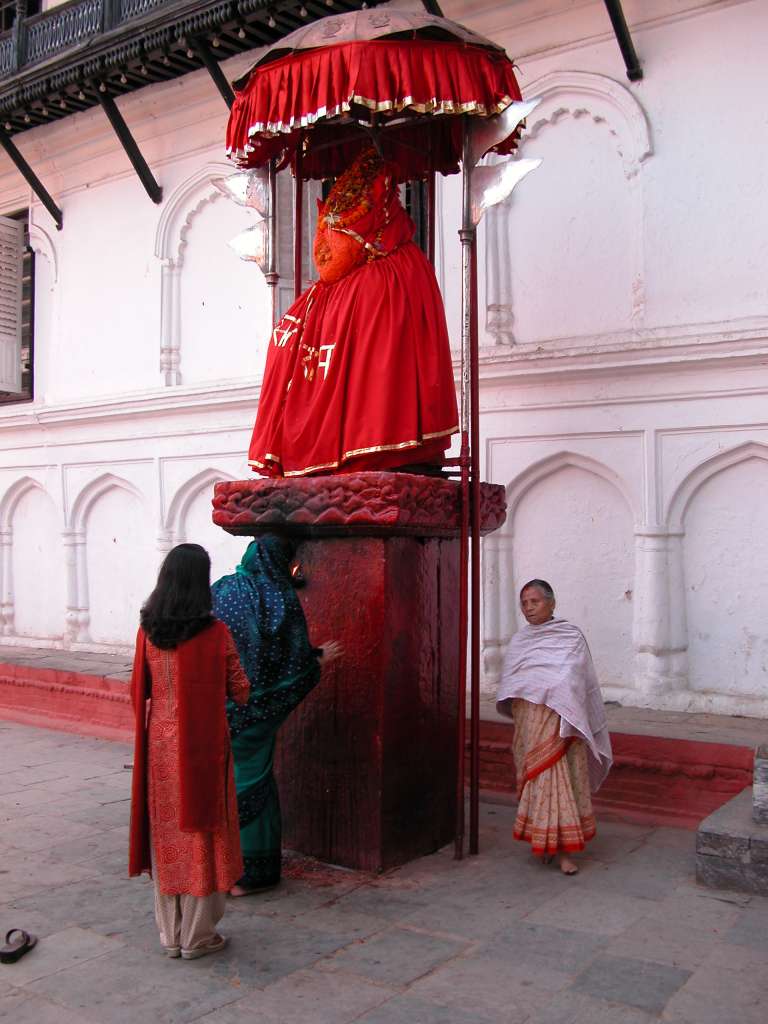 Manaslu 00 13 Kathmandu Durbar Square Hanuman Statue Kathmandu�s Durbar Square is presently known as Hanuman Dhoka, named after the statue of Hanuman (1672) near the entrance of the palace. Devout Hindus circle the Hanuman statue. The kneeling figure of Hanuman, the Hindu God who is always depicted in the form of a monkey, sits on a tall stone pedestal. It was consecrated in 1672.